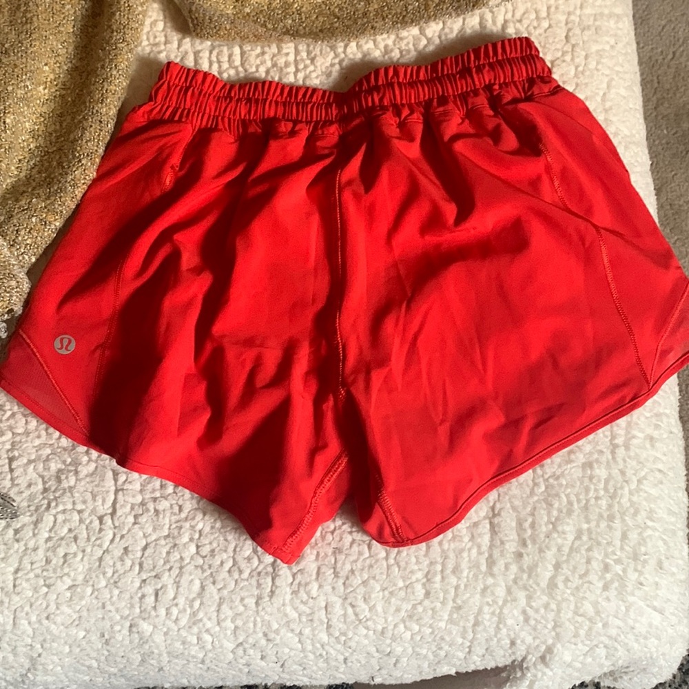 Lululemon athletic shorts size 4 Hottie hots low rise more of an orange red